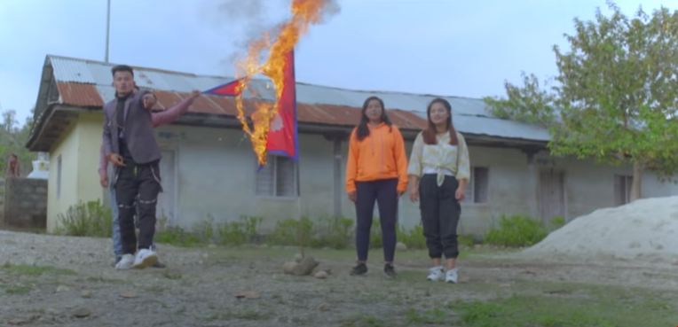 राष्ट्रिय झन्डा जलाएको म्युजिक भिडियो खिच्ने क्यामरामेन पक्राउ